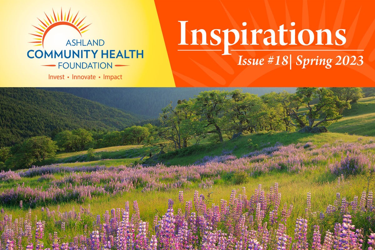 ACHF Newsletter Header pictured with a field of purple spring wildflowers