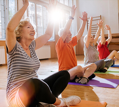 Ashland Community Health Foundation mission with image of yoga class